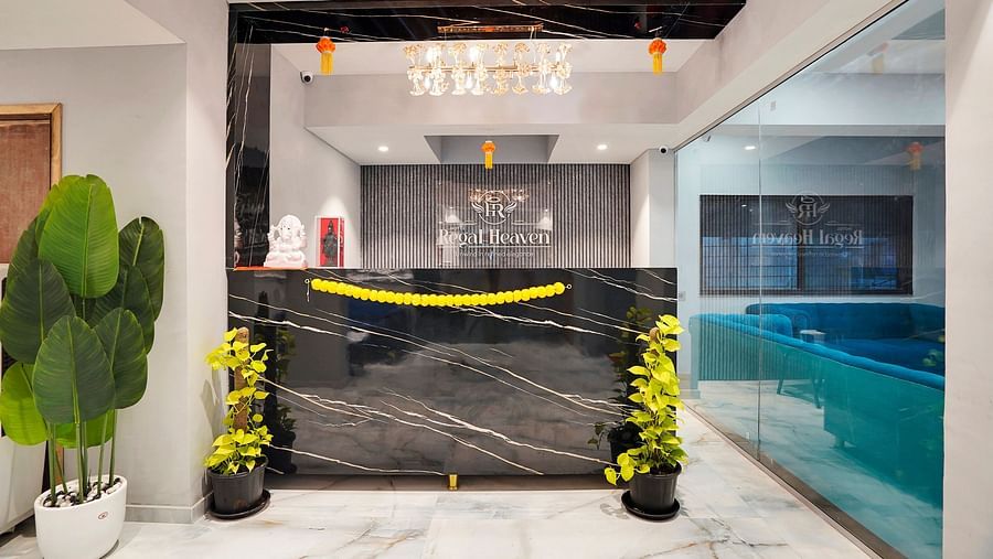 Reception desk in the lobby at Hotel Regal Heaven, Pune.