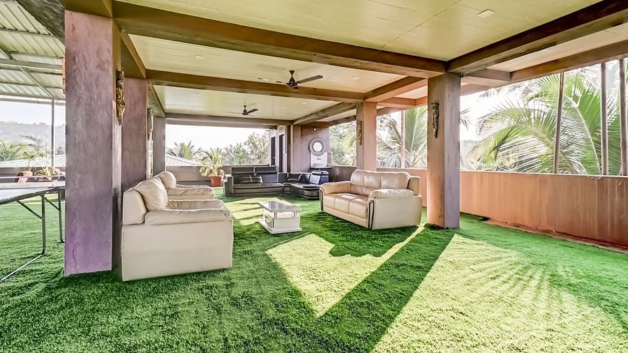 Deck area with furniture arranged neatly at Summit Calangute Resort & Spa