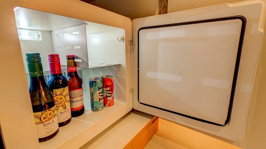 a mini bar set up with drinks 