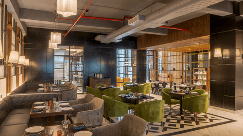tables in the restaurant at Hotel Polo Towers Agartala