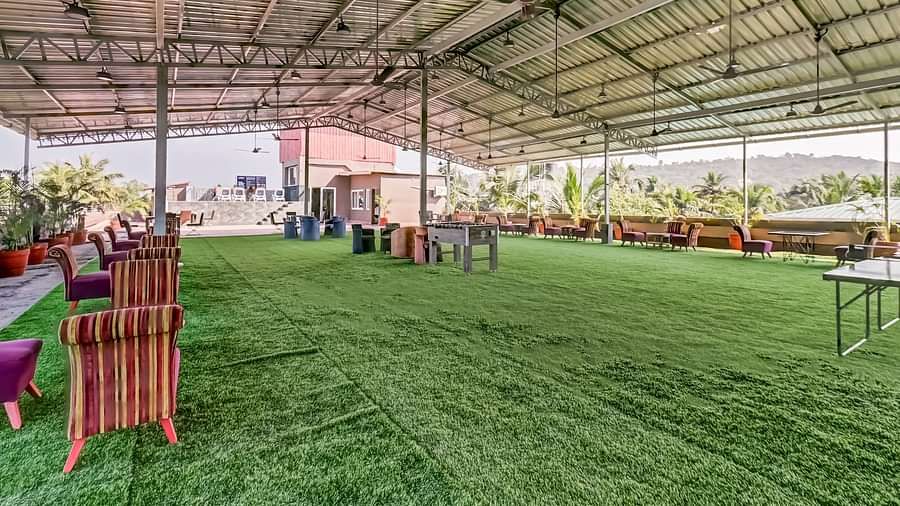 Deck area with furniture arranged neatly at Summit Calangute Resort & Spa