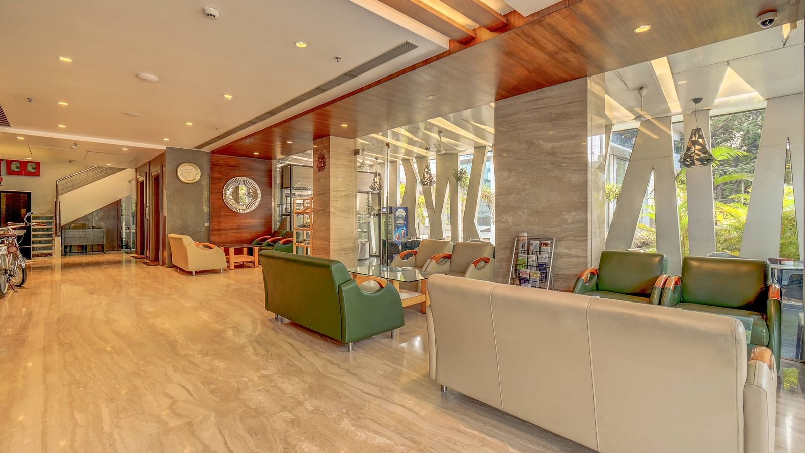 lobby with comfortable seating area at The SSK Solitaire Hotel & Banquets 