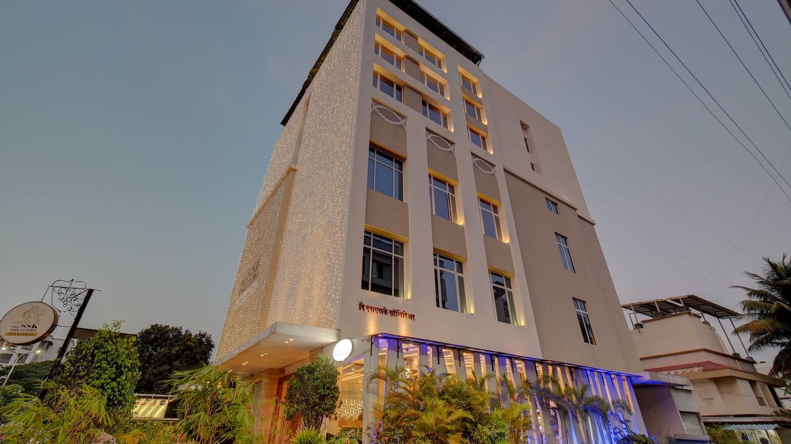 facade image of The SSK Solitaire Hotel & Banquets, Mumbai Naka - Nashik on a clear day