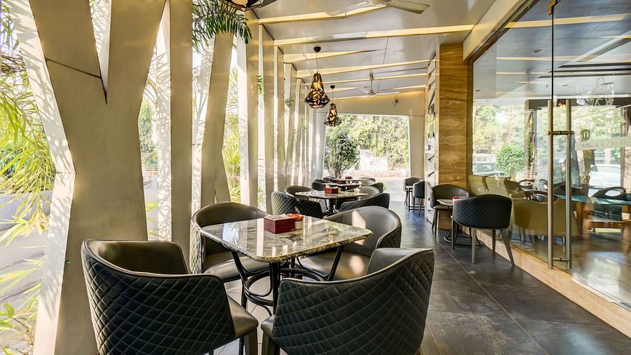 Charming outdoor cafe seating area at the Le Cafetino 