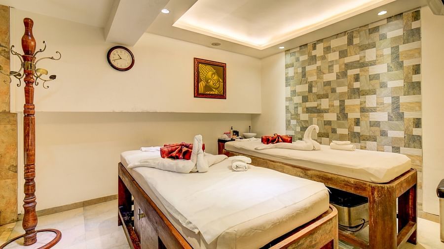 Luxurious spa treatment room setup with mirrors at the SSK spa 