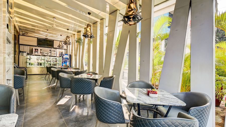Charming outdoor cafe seating area at the Le Cafetino 