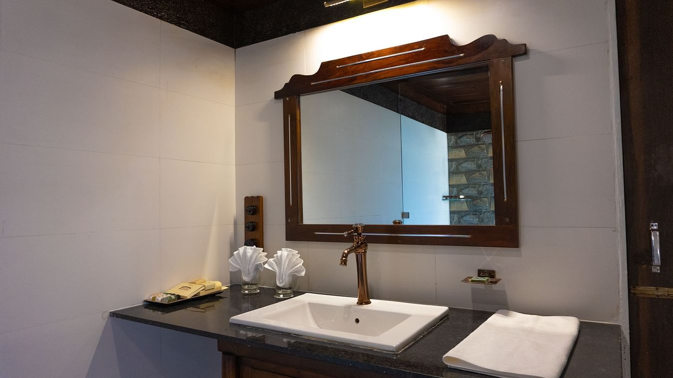 bathroom with modern amenities and a mirror at Jagira Ananta Elite