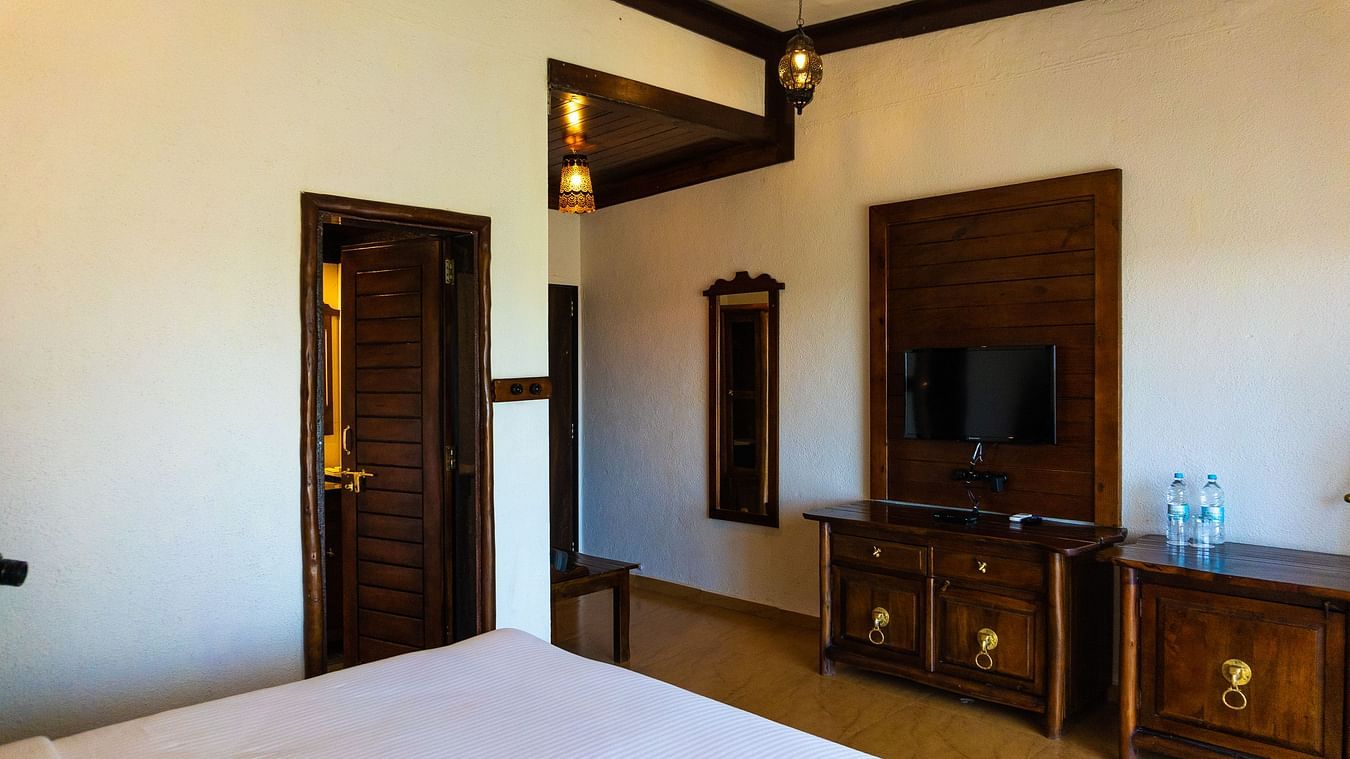 bedroom with amenities like TV at Jagira Ananta Elite