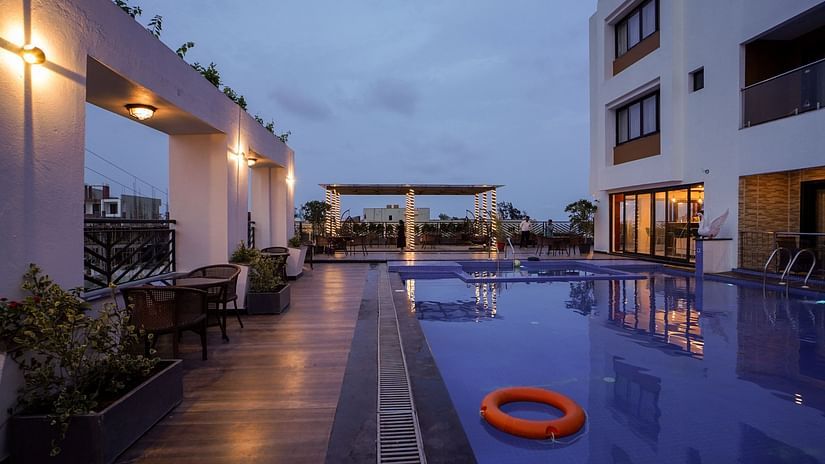 overview of the swimming pool with Shanti Seaview Resort & Spa on the right hand side