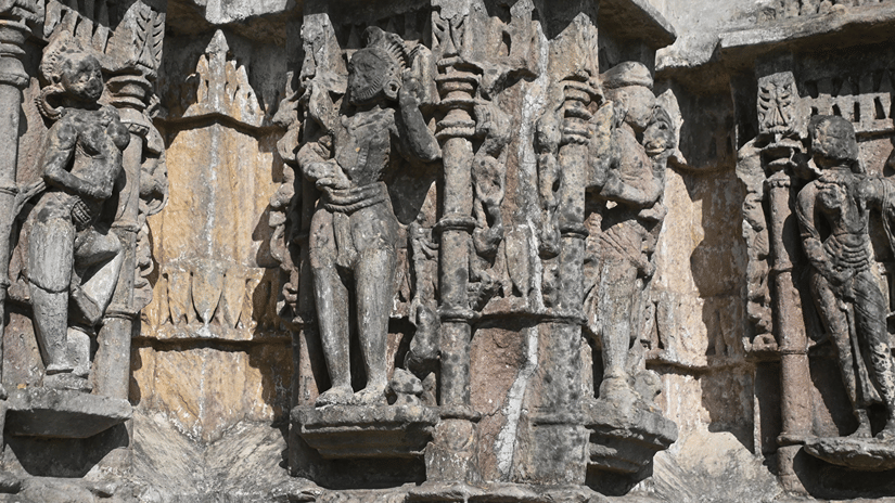 Ekvira Temple in Lonaval featuring intricately carved figurines on the walls and pillars