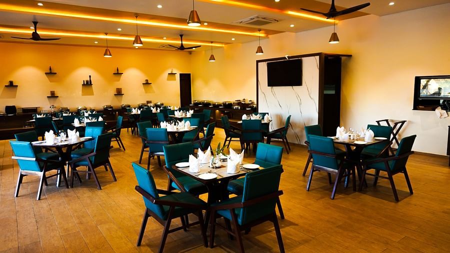 well lit sitting area in restaurant at Jagira Ananta Elite  3