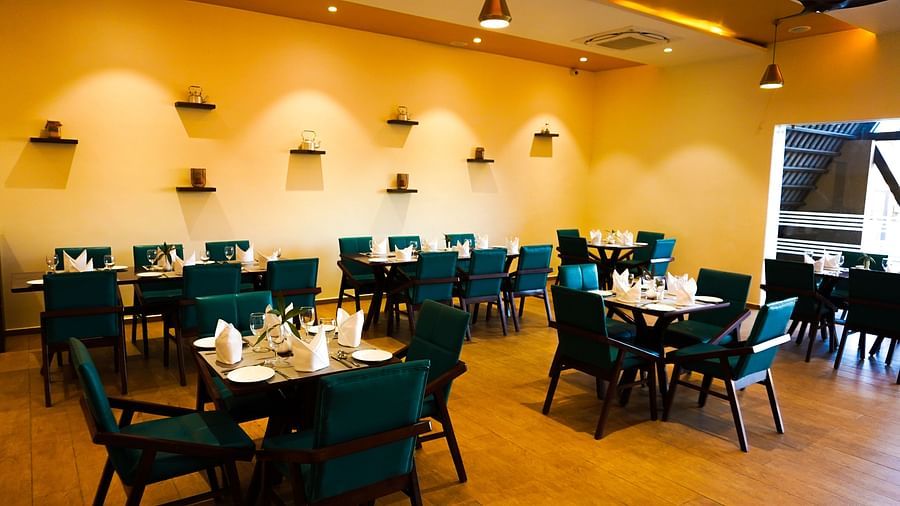 well lit sitting area in restaurant at Jagira Ananta Elite