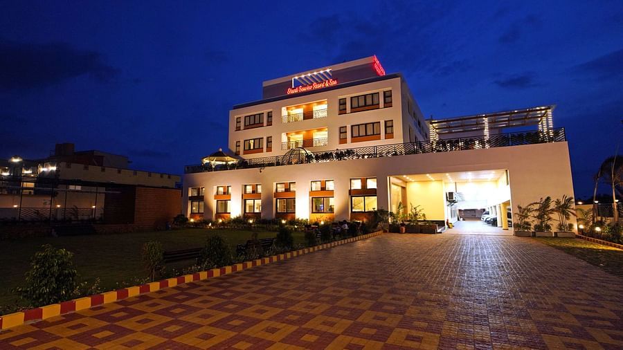 facade of Shanti Seaview Resort & Spa with a pathway leading to the resort - Mandarmani Hotels
