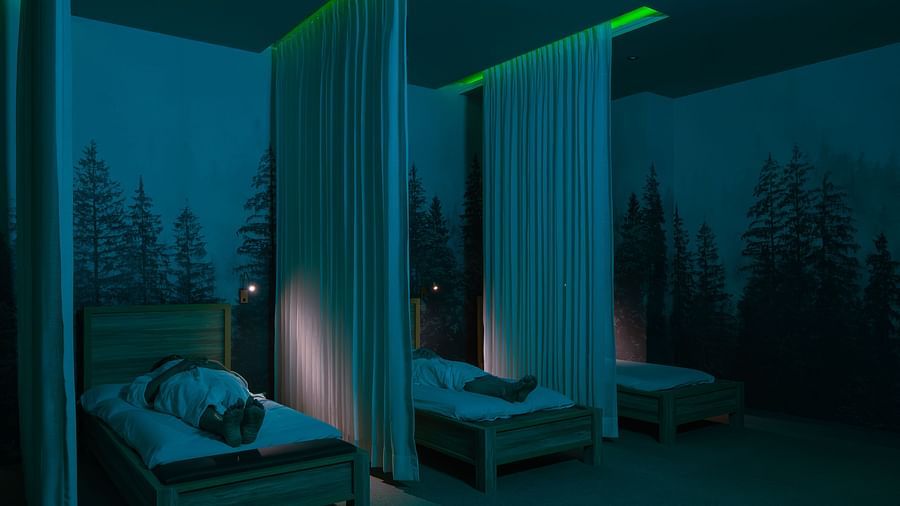 An image of two women lying on a bed to receive massage - The Manor Luxury Hotel, Shimla