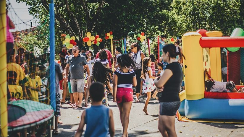 Kids playing in a theme park filled with fun games - Karma Lakelands.