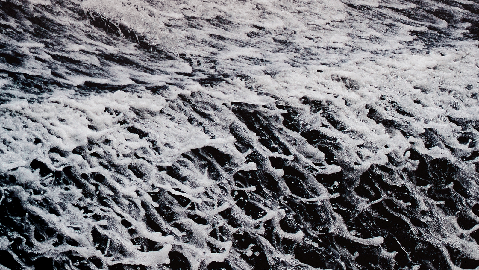 a close up shot of the water flows down Bhushi Dam 