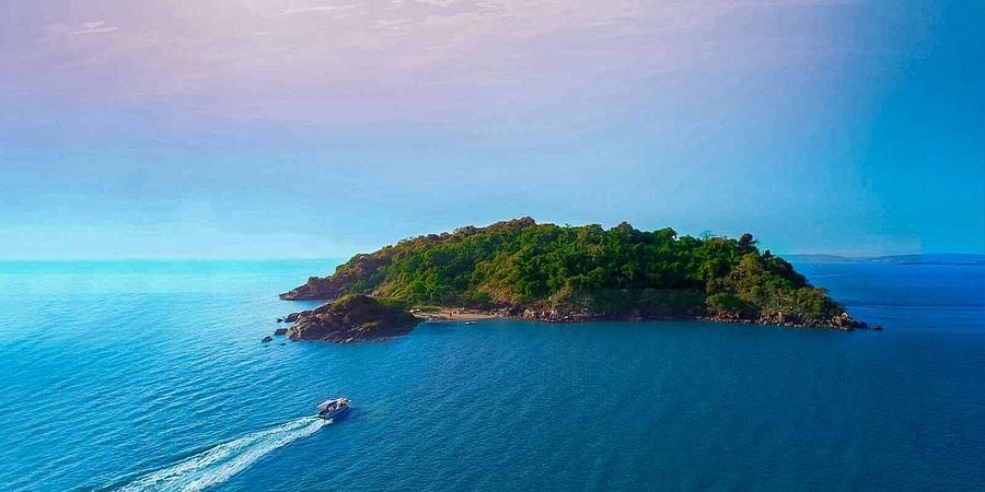 aerial view of the cintacor island resort in the midst of arabian sea