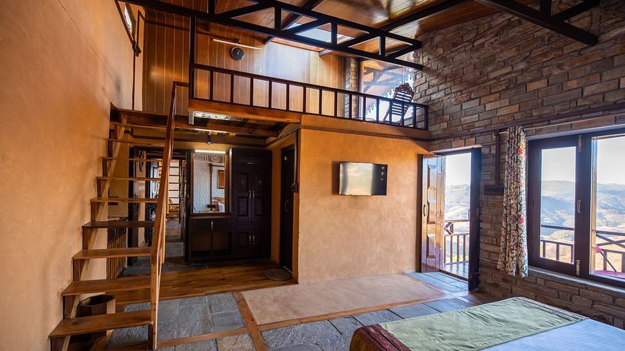 Comfortable rustic room interior with a charming wooden loft and natural furnishings. - Blusalzz Homes The Himalayan Bungalow, Almora