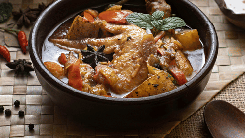 a bowl of chicken curry