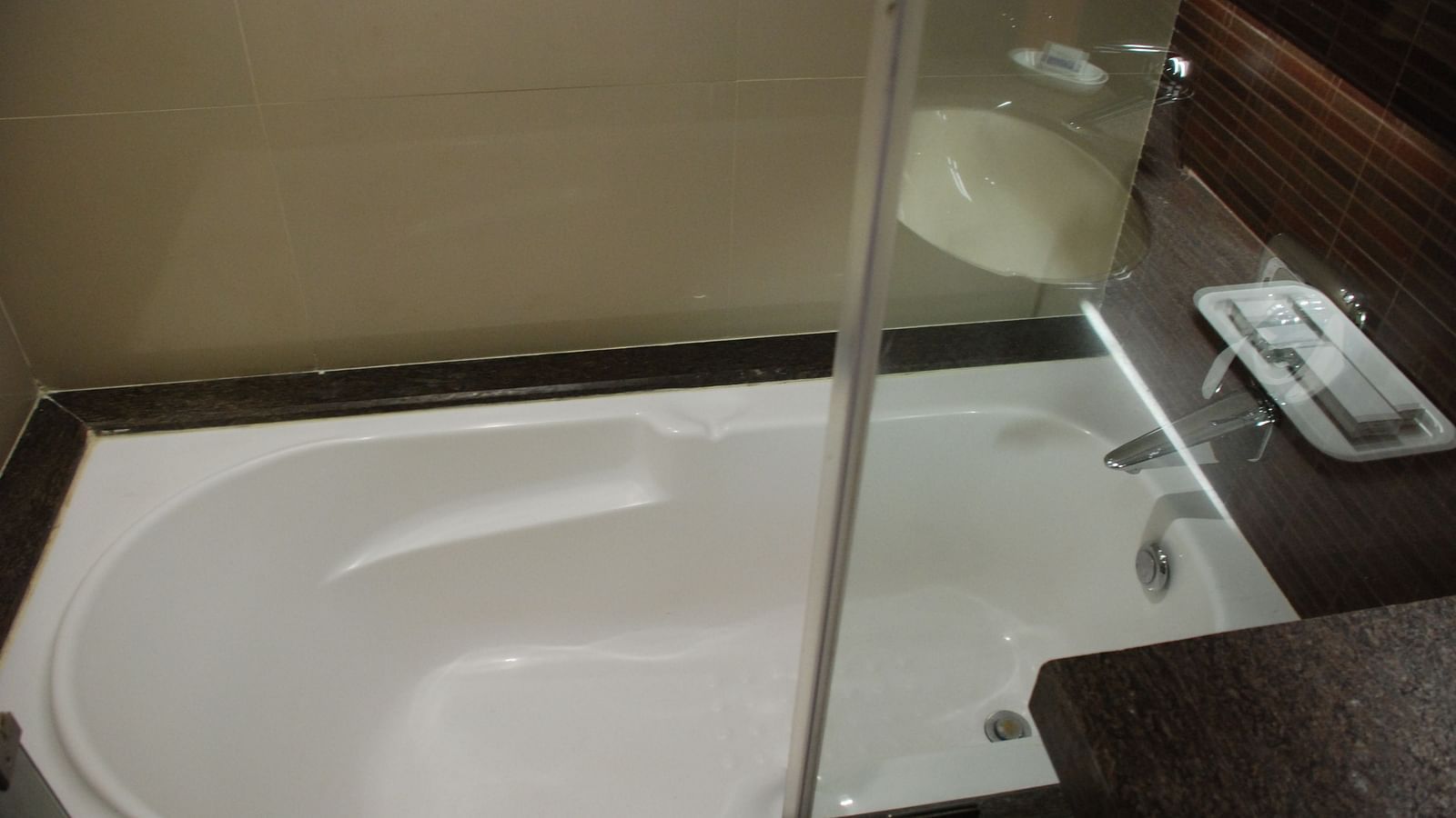 Image of a washroom with a bathtub at The Oriental Residency