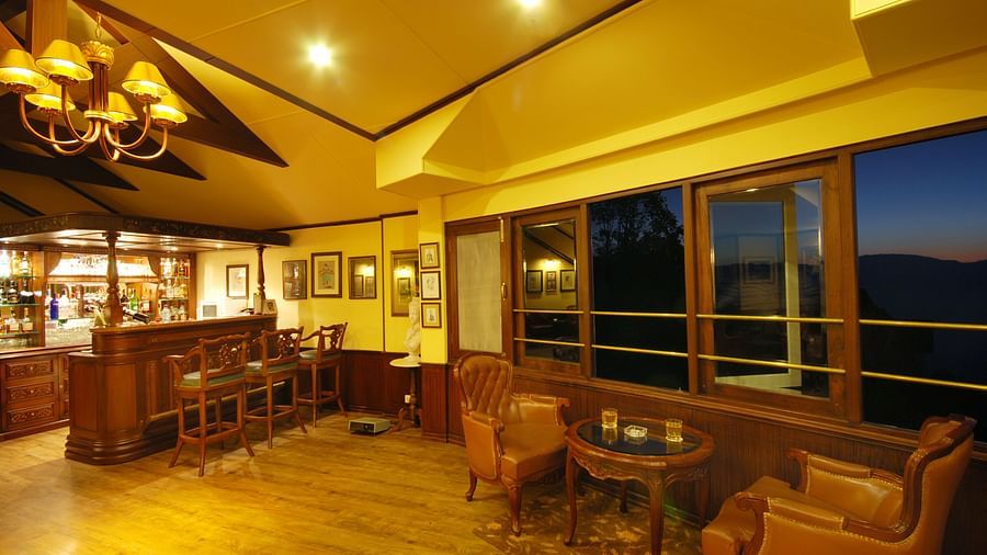 indoor seating space at the bar - Mayfair Hill Resort, Darjeeling 1