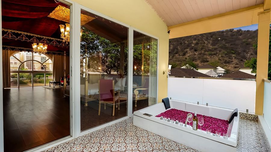 An overview of the bathroom inside one of the rooms with a bathtub seen - Rajasthali Resort & Spa, Jaipur.