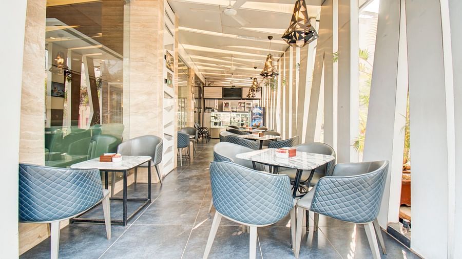 Charming outdoor cafe seating area at the Le Cafetino 