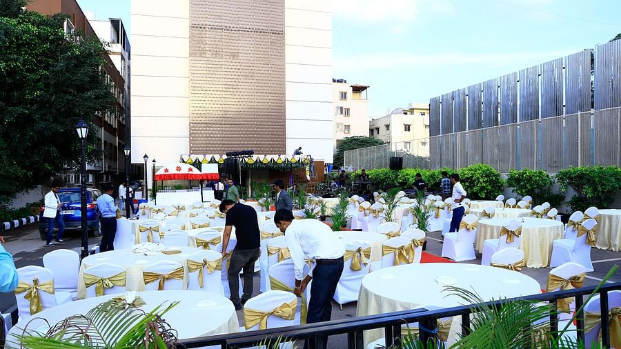 An image of our outdoor event venue in Brookefield with setting up the tables and chairs for the main event - Grand Continent, Brookefield