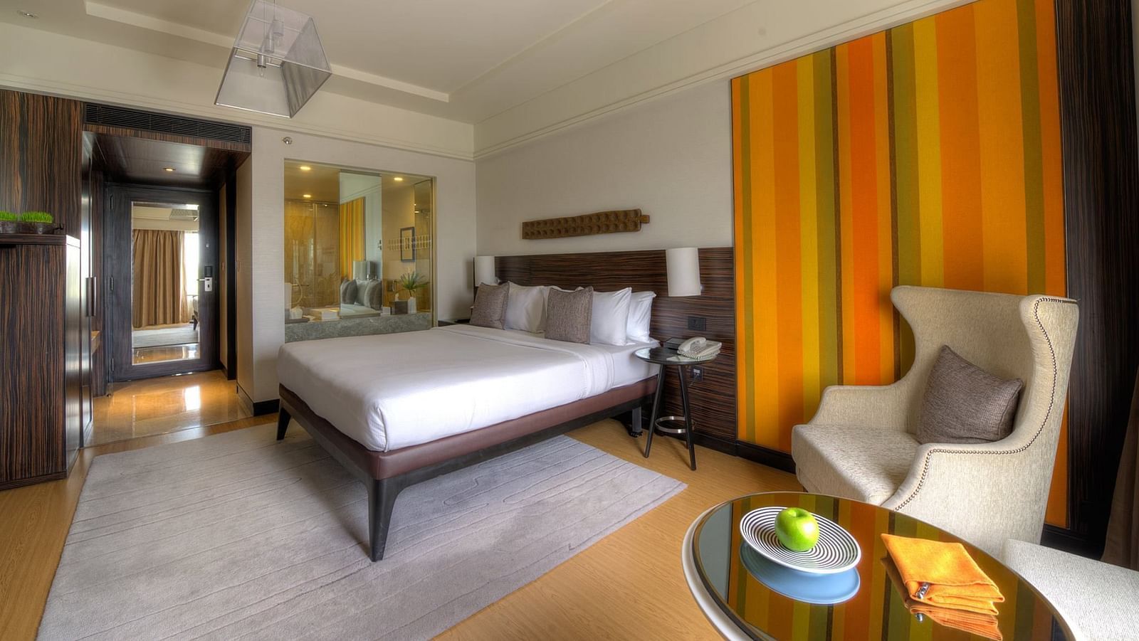 Image of club room at The Raintree St. Mary s Road with a bed and a sofa
