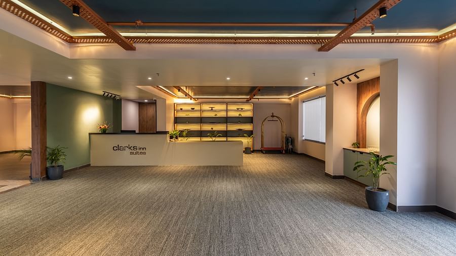 Reception of Clarks Inn Suites Jaipur, Ajmer Road featuring a big floor and a well illuminated reception desk at one end of the floor