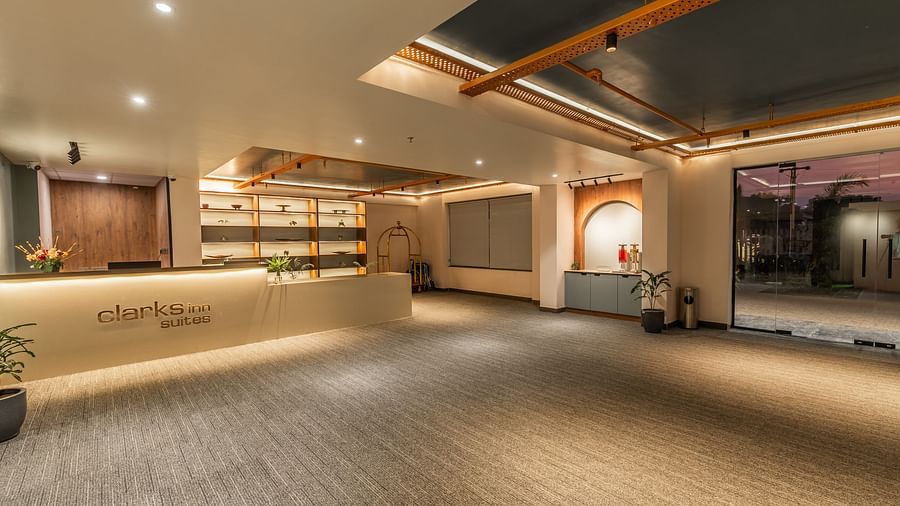 Reception at Clarks Inn Suites Jaipur, Ajmer Road featuring its way from the entrance to the reception desk and refreshment arranged by the entrance