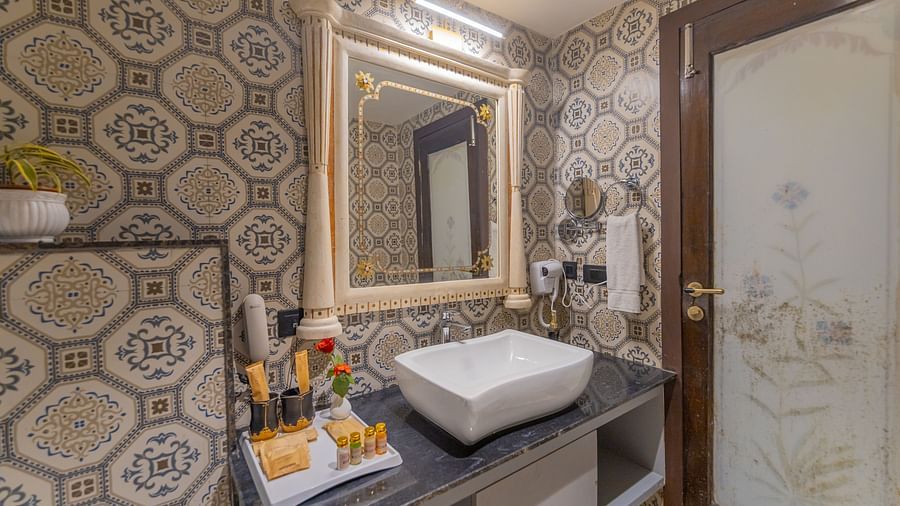 Stylish wash area with patterned tiles at Clarks Resort The Archi's Castle, Ajmer.