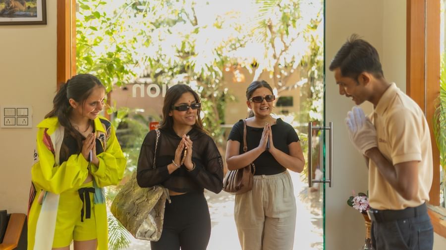 A warm welcome being exchanged between three guests and a staff at the reception area with folded hands at Daksh Resort and Amusement Park.