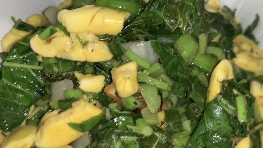 A green salad featuring leafy greens and vegetable pieces | Altamont Court, Jamaica