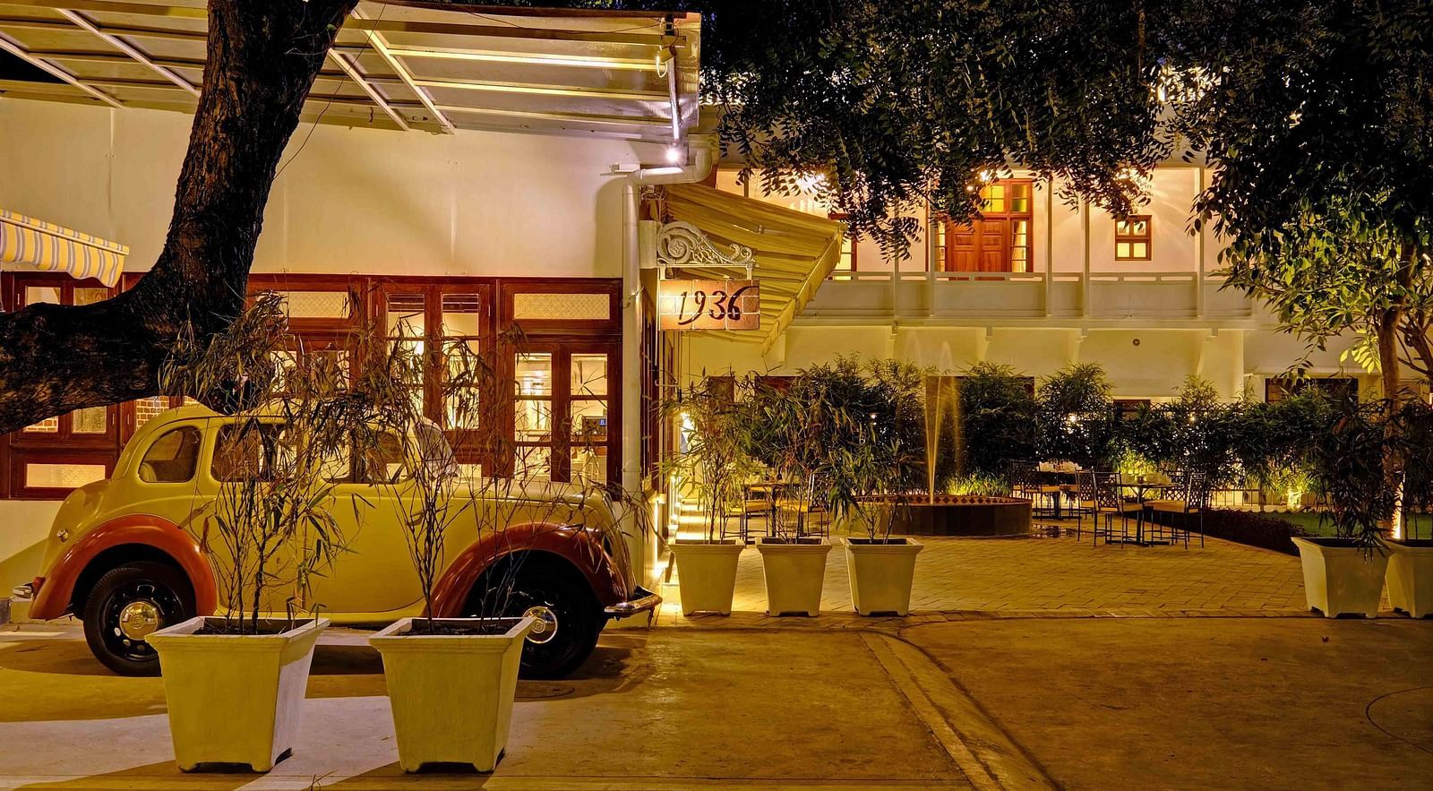 exterior of Saraca Lucknow with a white car placed in front of it