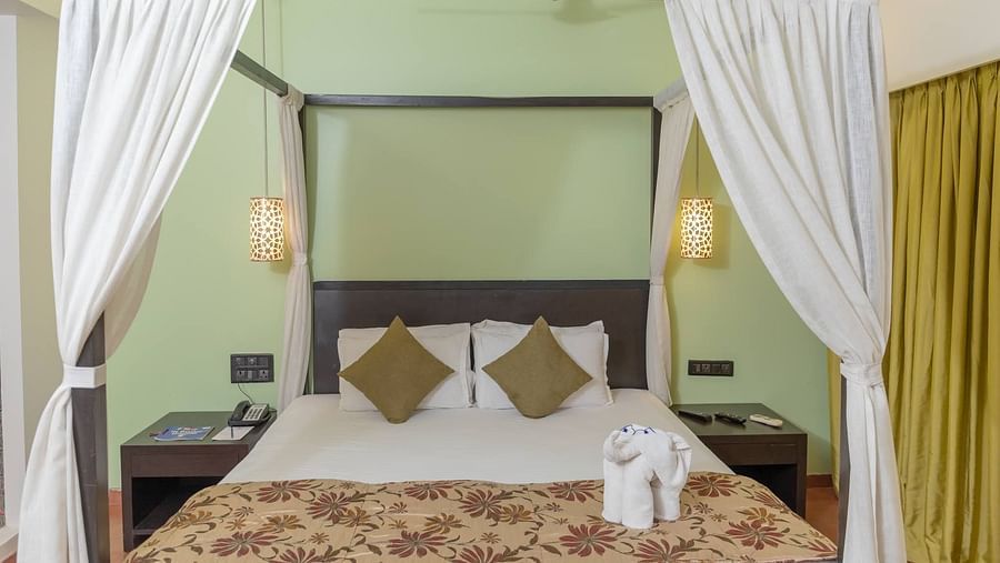 View of a king size bed in the Superior room at Kyriad Prestige Calangute, Goa