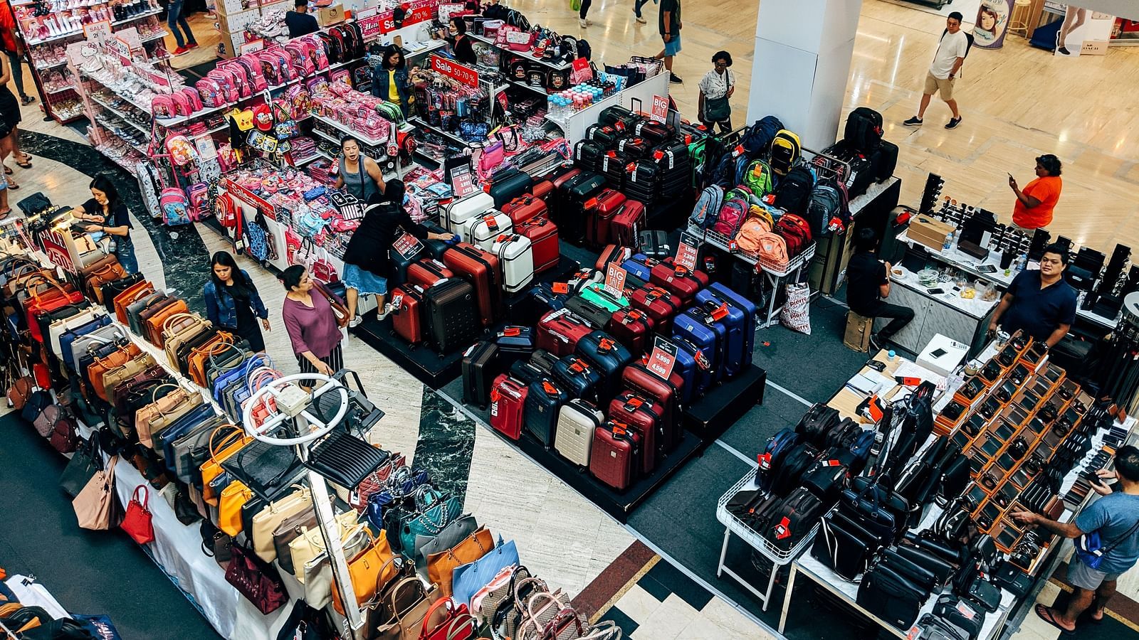 an overview of a shopping area inside a mall with many different items of display