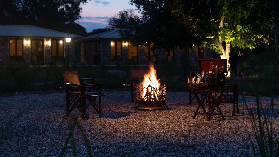 camp fire in front of a tent - Aalia Jungle Resort & Spa