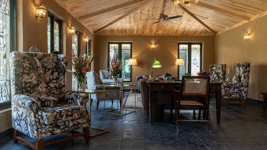 A sitting area with couches made of luxurious colonial style leather - Aalia Jungle Resort & Spa