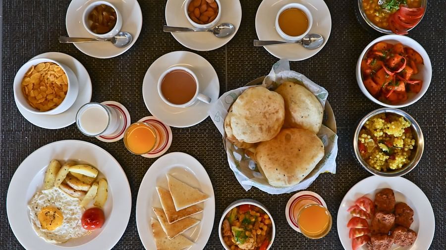 A table filled witn a variety of food items at The Soma Hotel by Avianna Group, Darjeeling