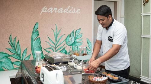 chef setting up buffet breakfast