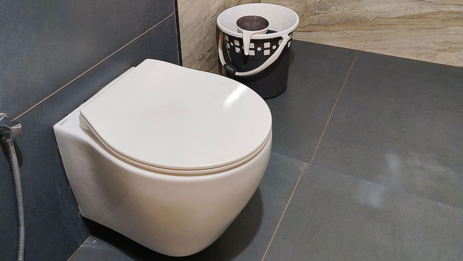 A W/C in the washroom at 101 non ac room at Ananda Holiday Home, Wayanad 6