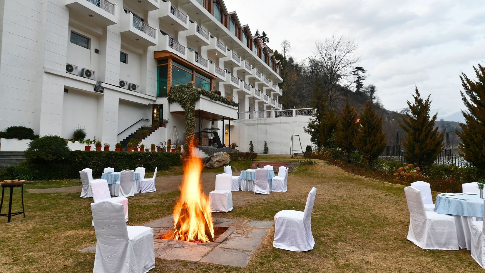 seating arrangements around bonfire at Mastiff Grand, Manali