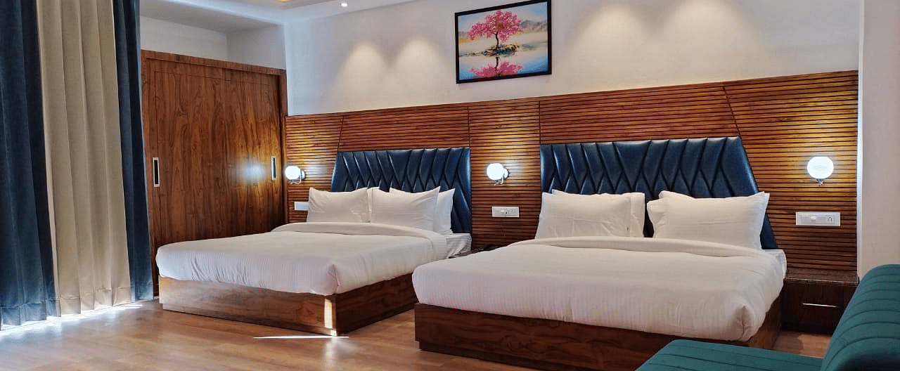 Two large beds in Family Suite Room at DLS Ark Holiday Inn, Banikhet.