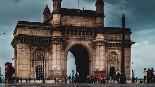 the brown building of Gateway of India