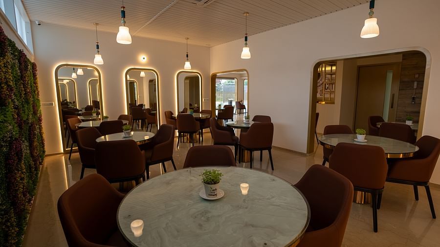 A image of dining area with round tables and chairs arranged - VRR Astoria Hotel and Conventional Centre