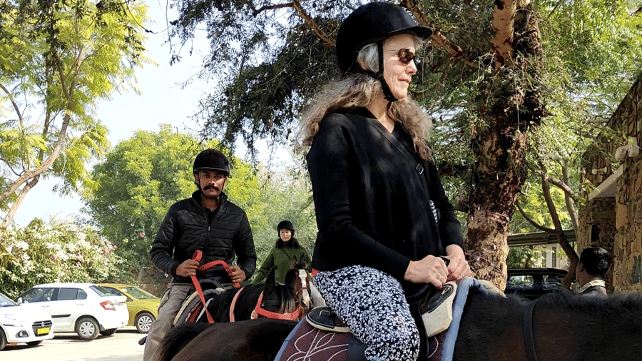 An image of a man riding a horse - Utsav Camp Sariska
