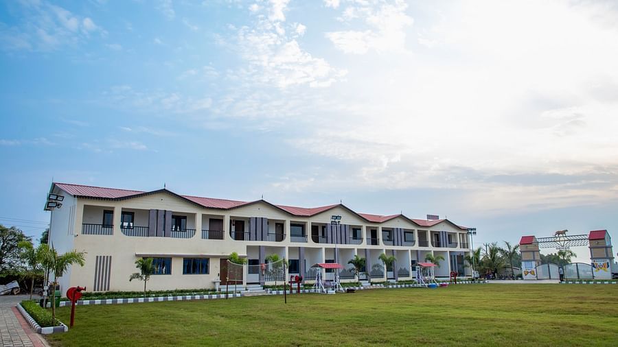 Facade image of the resort with a beautiful blue coloured sky with clouds in the background - VITS Select Diamond Resort, Sasan Gir