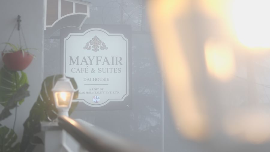 Aesthetic shot of a lantern-style wall light with a soft, blurred background - Mayfair Cafe & Suites, Dalhousie