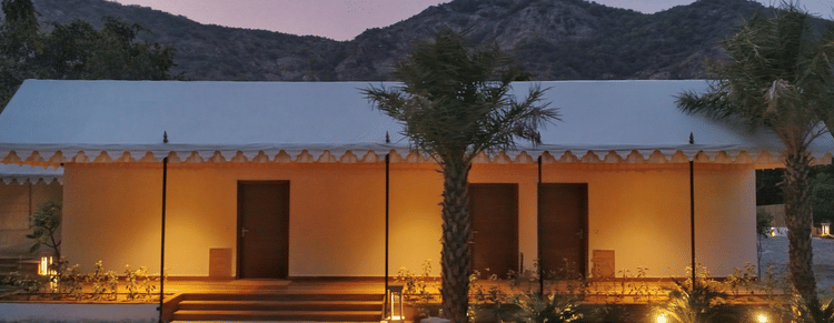 The exterior of our tent suites in Pushkar lit up during dusk 